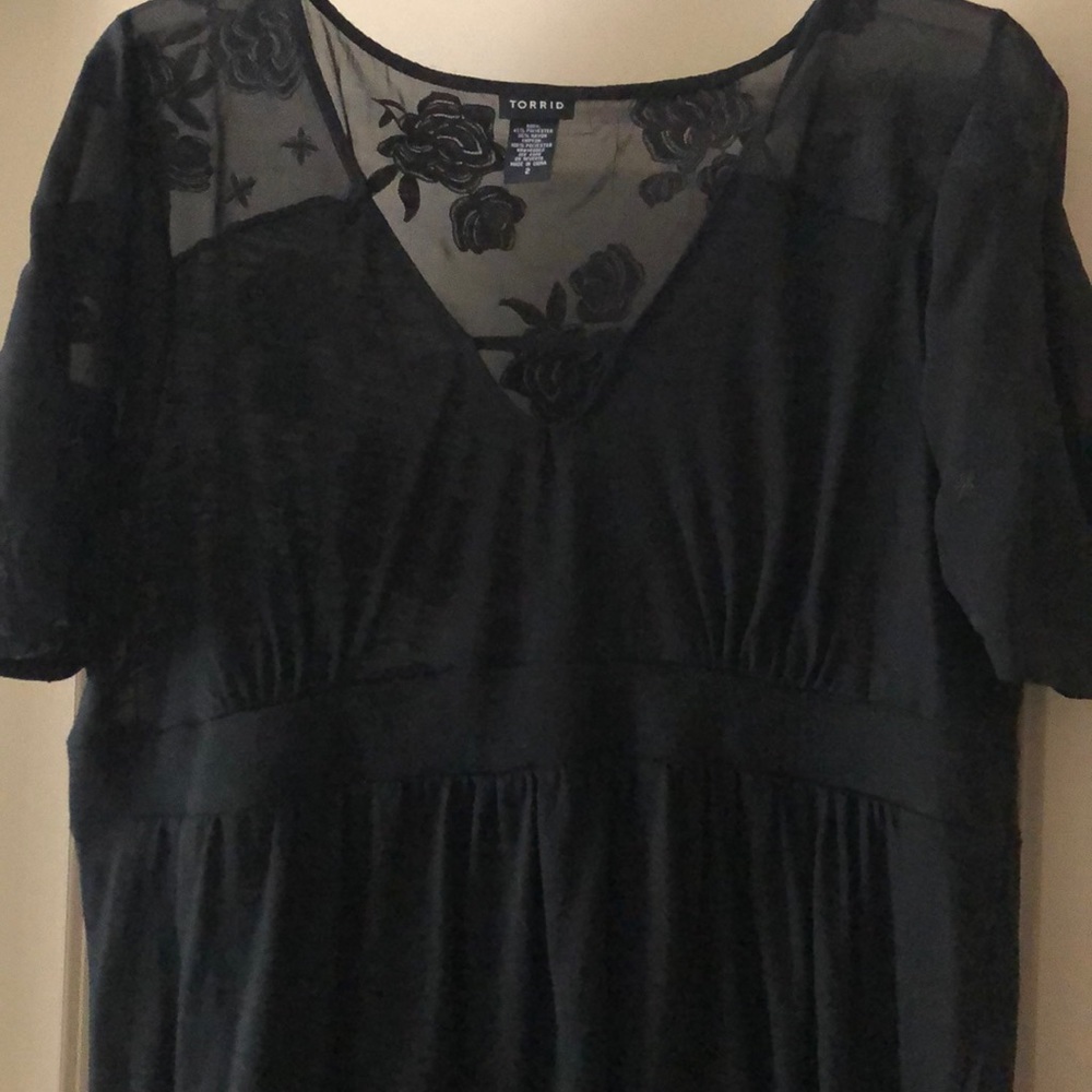 Black appliqué Torrid shirt.